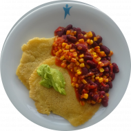 2 Polenta Pancakes mit Bohnen-Mais-Chilli dazu Guacamole (3,18,81,84)