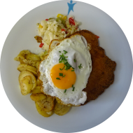 'Haufen Mist' Schweineschnitzel mit 1 Spiegelei auf Bratkartoffeln und Bacon (2,3,15,81)