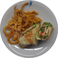 Wrap Caprese mit Mozzarella, Tomate, Rucola und Basilikum (19,81) dazu Twister Pommes (81)