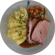 Hausgemachter Wiegebraten (1,2,3,8,46) mit Bratensoße (81) und Mischgemüse dazu Kartoffelpüree (19)