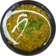 'Indisches Dal' Linsen-Kartoffel-Curry mit frischer Minze (2,3,18,81) dazu Fladenbrot (23,81)