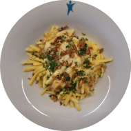 Badische Käsespätzle an Röstzwiebeln mit Käse gratiniert (1,15,19,81)