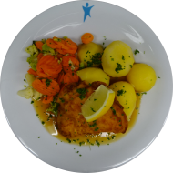 Schweineschnitzel 'Toscana' in würziger Kräuterpanade (15,81) mit Bratenjus und Kaisergemüse dazu Schwenkkartoffeln