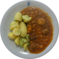 Kürbisgulasch mit Waldpilzen (49,81) dazu Petersilienkartoffeln