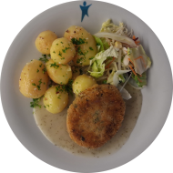 Möhren-Zucchini-Bratling (1,3,21,81,84) an Dillsoße (1,81) dazu Sesamkartoffeln (23) und Salatgarnitur
