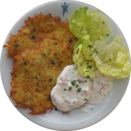 2 Hausgemachte Kürbiskernrösti mit Tomaten-Schnittlauch-Quark und Blattsalat (2,3,15,19,24,81)